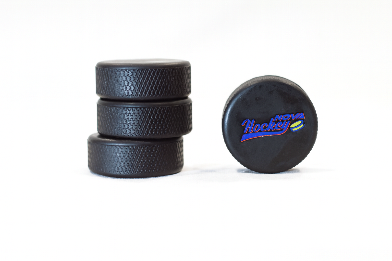 4 Nova Hockey Pucks